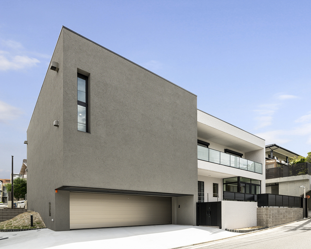 名古屋市昭和区の注文住宅のシンプルな外観デザインのおしゃれなガレージハウス新築写真